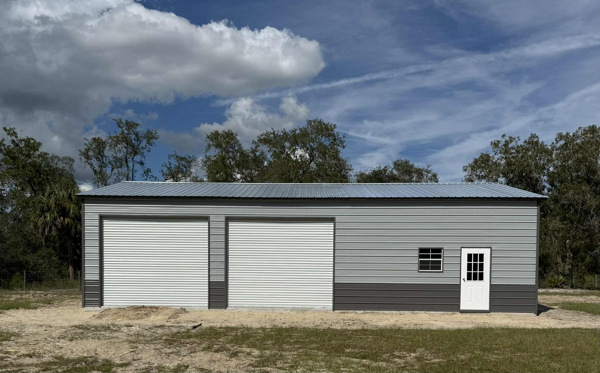 Gray and white metal building