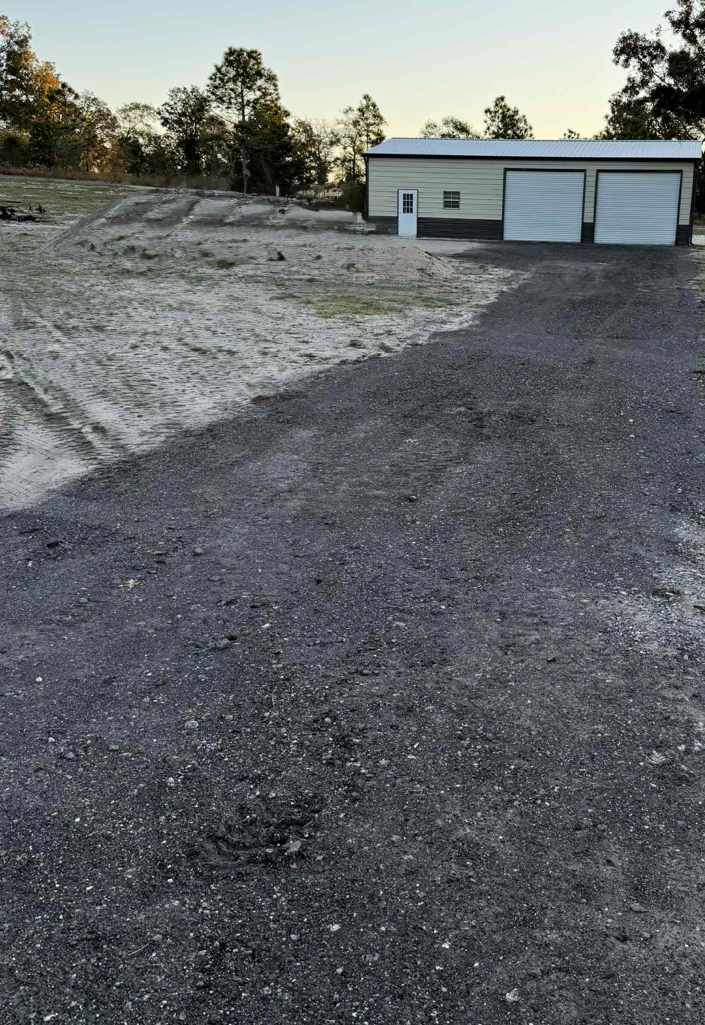 Side view of tan metal garage